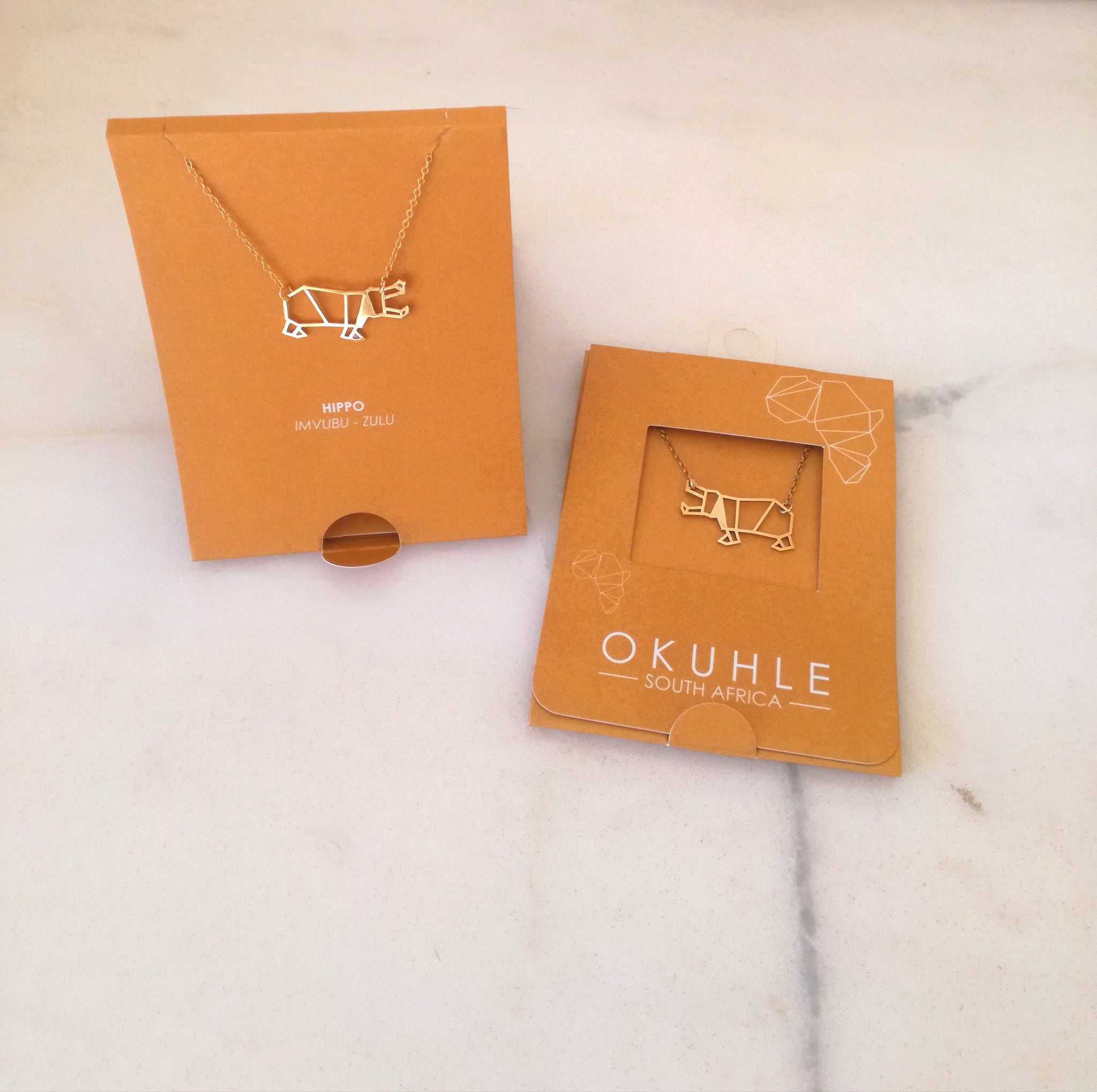 OKUHLE Hippo pendant & necklace - packaging